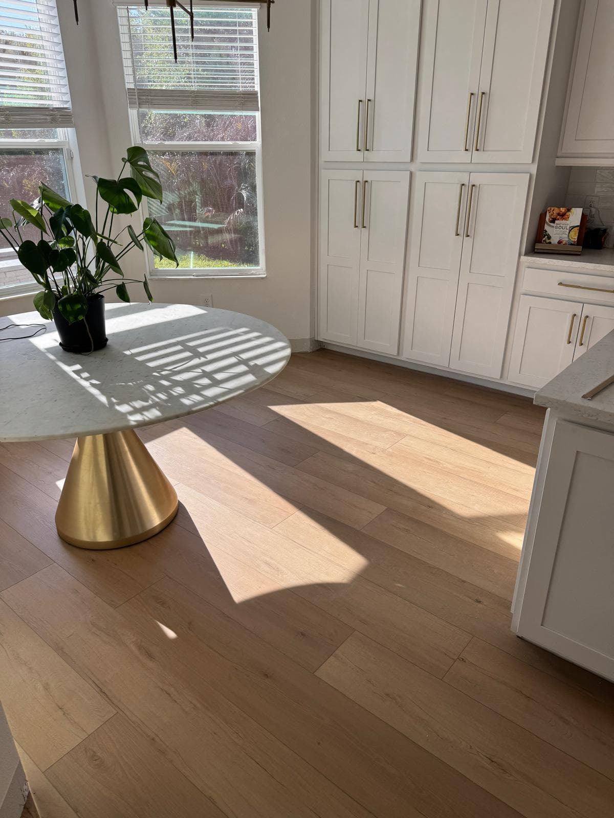 Oak LVP flooring installed in a full living area